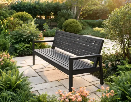 Polywood garden bench on a patio path